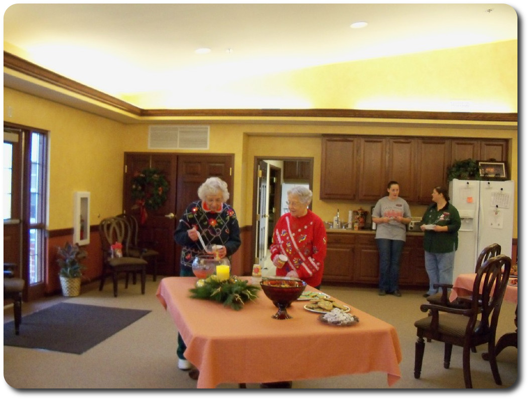 Residents enjoying punch at our Christmas Party