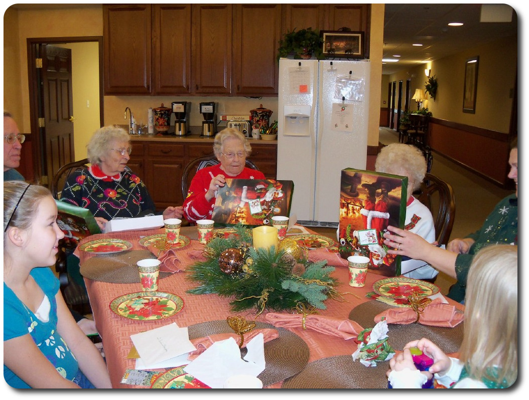 Residents enjoying Christmas Gifts from Santa