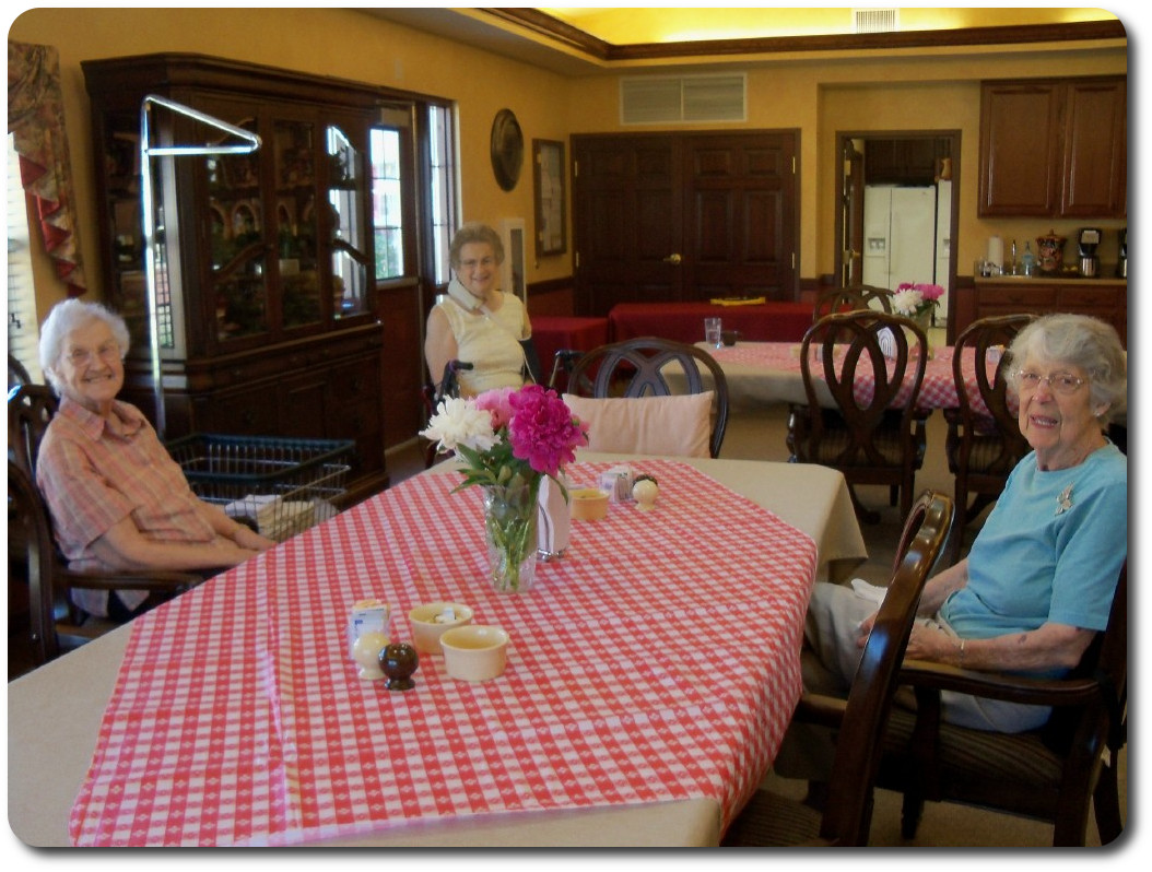 Residents enjoying monthly resident meal of choice, this paticular one was a picnic theme.